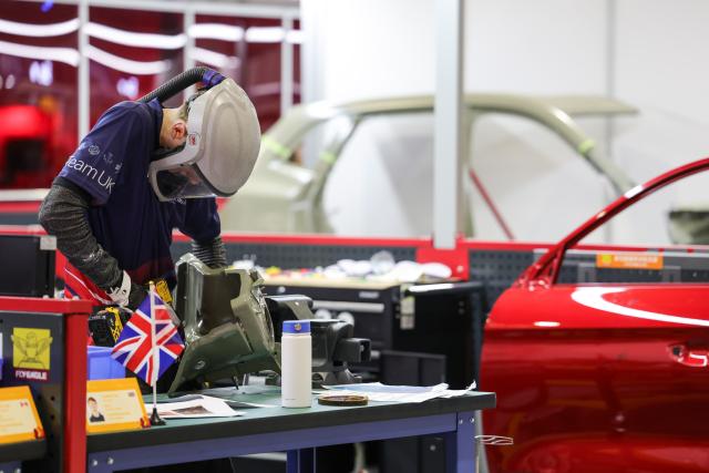 (260925) -- SHANGHAI, Sept. 25, 2026 (Xinhua) -- A contestant participates in the autobody repair event during the 48th WorldSkills Competition in Shanghai, east China, Sept. 24, 2026.
  The 48th WorldSkills Competition is held in Shanghai from September 22 to 27. 
  Various events in the competition are related in the maintenance of equipment and facilities in the air, on land and on rails. (Xinhua/Wang Jingqiang)