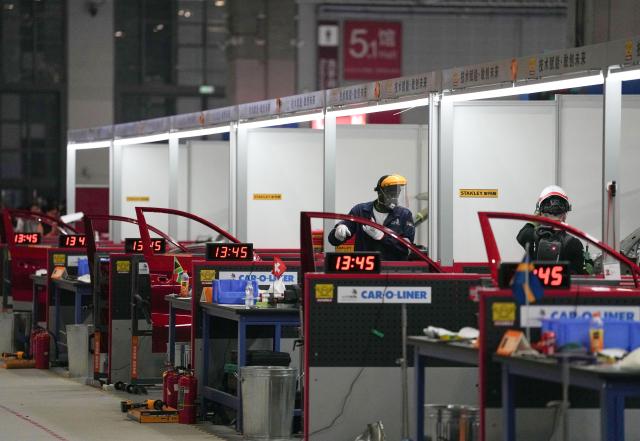 (260925) -- SHANGHAI, Sept. 25, 2026 (Xinhua) -- Contestants participate in the autobody repair event during the 48th WorldSkills Competition in Shanghai, east China, Sept. 25, 2026.
  The 48th WorldSkills Competition is held in Shanghai from September 22 to 27. 
  Various events in the competition are related in the maintenance of equipment and facilities in the air, on land and on rails. (Xinhua/Ren Pengfei)