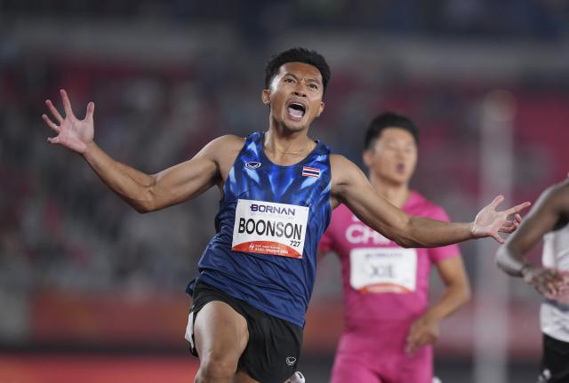 (260925) -- NAGOYA, Sept. 25, 2026 (Xinhua) -- Boonson Puripol of Thailand celebrates after winning the men's 100m final of Athletics at the 20th Asian Games Aichi-Nagoya 2026 in Nagoya, Japan, Sept. 25, 2026. (Xinhua/Lui Siu Wai)