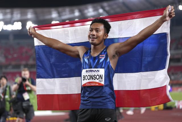 (260925) -- NAGOYA, Sept. 25, 2026 (Xinhua) -- Boonson Puripol of Thailand celebrates after winning the men's 100m final of Athletics at the 20th Asian Games Aichi-Nagoya 2026 in Nagoya, Japan, Sept. 25, 2026. (Xinhua/Jia Yuchen)