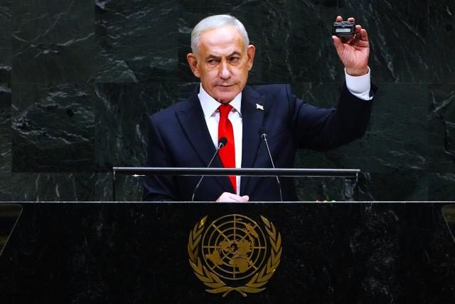 (260925) -- UNITED NATIONS, Sept. 25, 2026 (Xinhua) -- Israeli Prime Minister Benjamin Netanyahu holds up a pager as he addresses the general debate of the 81st session of the United Nations General Assembly (UNGA) at the UN headquarters in New York, Sept. 24, 2026. Scores of delegates walked out of the United Nations General Assembly hall in protest as Israeli Prime Minister Benjamin Netanyahu took the podium to address the general debate of the 81st session.
  Netanyahu used his speech to defend Israel's military actions in Gaza and elsewhere in the region, amid growing international criticism and diplomatic isolation. (Xinhua/Wu Xiaoling)