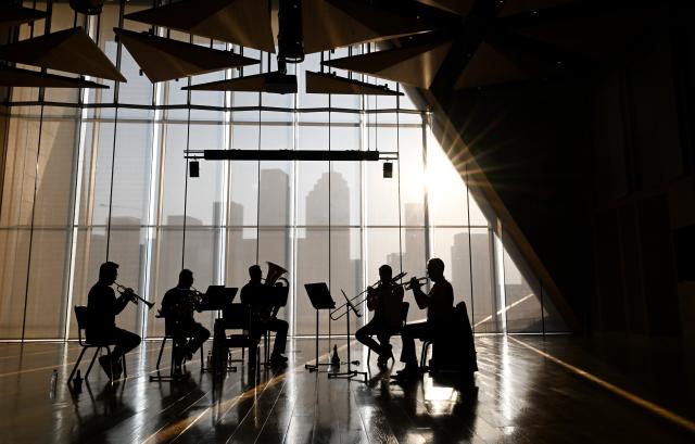 (260926) -- TIANJIN, Sept. 26, 2026 (Xinhua) -- Members of an all-faculty brass quintet rehearse at the Tianjin Juilliard School in Tianjin, north China, Sept. 15, 2026.
  Lee Allen, a U.S. trombonist, joined the Tianjin Juilliard School as one of its first resident faculty members in 2019. 
  In 2017, while still teaching in the U.S. state of Ohio, Allen led five students on a month-long tour across China, covering 17 cities and staging 19 concerts. This immersive experience gave him deep insight into China's thriving artistic landscape. He noted that the abundance of opportunities, strong institutional support for the arts, and Tianjin's livable urban environment convinced him to build his long-term career here. 
  Over the years, Allen has dedicated himself to nurturing young musical talent, with generations of his students going on to perform on leading international stages. His two children were both born and raised in Tianjin, making the city a true family home. 
  This year, the Tianjin Juilliard School formed its first all-faculty brass quintet, a rare opportunity that allows Allen to perform alongside his peers and deepen his artistic practice. 
  For Allen, music bridges different civilizations, and the Tianjin Juilliard School is a dynamic platform for exchange between Chinese and U.S. arts education. "Teaching is a two-way journey of growth," he said. "While I guide my students, they also teach me every day." (Xinhua/Sun Fanyue)