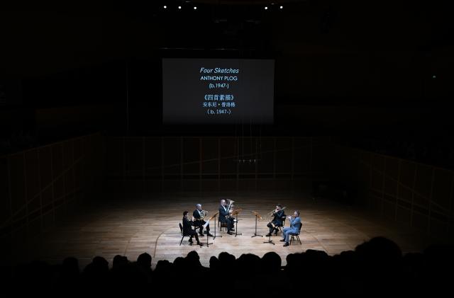 (260926) -- TIANJIN, Sept. 26, 2026 (Xinhua) -- Lee Allen (2nd R) plays the trombone in a brass quintet performance at the Tianjin Juilliard School in Tianjin, north China, Sept. 18, 2026.
  Lee Allen, a U.S. trombonist, joined the Tianjin Juilliard School as one of its first resident faculty members in 2019. 
  In 2017, while still teaching in the U.S. state of Ohio, Allen led five students on a month-long tour across China, covering 17 cities and staging 19 concerts. This immersive experience gave him deep insight into China's thriving artistic landscape. He noted that the abundance of opportunities, strong institutional support for the arts, and Tianjin's livable urban environment convinced him to build his long-term career here. 
  Over the years, Allen has dedicated himself to nurturing young musical talent, with generations of his students going on to perform on leading international stages. His two children were both born and raised in Tianjin, making the city a true family home. 
  This year, the Tianjin Juilliard School formed its first all-faculty brass quintet, a rare opportunity that allows Allen to perform alongside his peers and deepen his artistic practice. 
  For Allen, music bridges different civilizations, and the Tianjin Juilliard School is a dynamic platform for exchange between Chinese and U.S. arts education. "Teaching is a two-way journey of growth," he said. "While I guide my students, they also teach me every day." (Xinhua/Sun Fanyue)