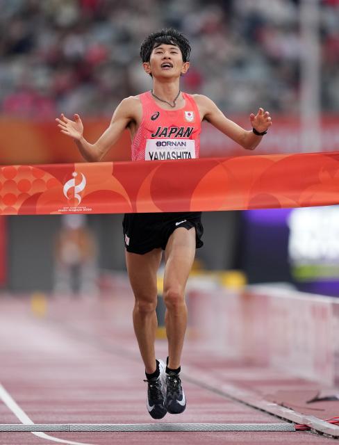 (260926) -- NAGOYA, Sept. 26, 2026 (Xinhua) -- Yamashita Ichitaka of Japan crosses the finish line during the men's marathon final of Athletics at the 20th Asian Games Aichi-Nagoya 2026 in Nagoya, Japan, Sept. 26, 2026. (Xinhua/Lui Siu Wai)