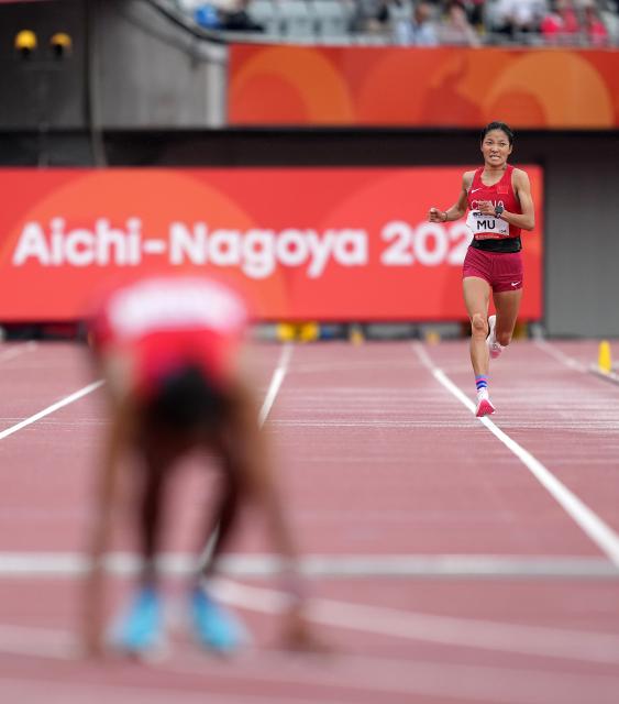 (260926) -- NAGOYA, Sept. 26, 2026 (Xinhua) -- Cirencuomu (R) of China competes during the women's marathon final of Athletics at the 20th Asian Games Aichi-Nagoya 2026 in Nagoya, Japan, Sept. 26, 2026. (Xinhua/Lui Siu Wai)