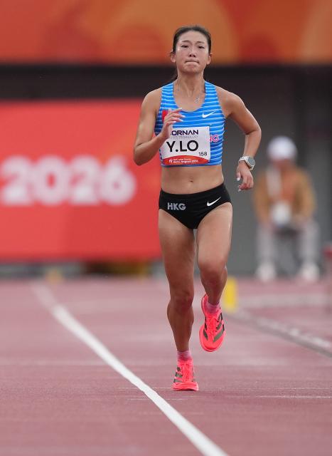 (260926) -- NAGOYA, Sept. 26, 2026 (Xinhua) -- Lo Ying Chiu of Hong Kong, China sprints to the finish line during the women's marathon final of athletics at the 20th Asian Games Aichi-Nagoya 2026 in Nagoya, Japan, Sept. 26, 2026. (Xinhua/Lui Siu Wai)