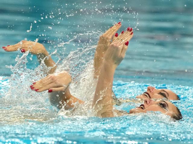 (260926) -- HAMAMATSU, Sept. 26, 2026 (Xinhua) -- Anastasiya Bakhtyreva/Violetta Evenko of Uzbekistan perform during the duet technical routine of artistic swimming at the 20th Asian Games Aichi-Nagoya 2026 in Hamamatsu of Shizuoka Prefecture, Japan, Sept. 26, 2026. (Xinhua/Cen Yunpeng)