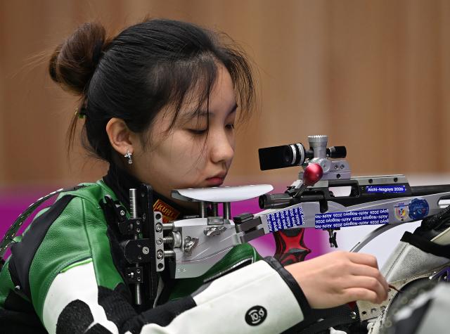 (260926) -- TOYOTA, Sept. 26, 2026 (Xinhua) -- Zhang Liyuan of China competes during the 50m rifle 3 positions women individual final of shooting at the 20th Asian Games Aichi-Nagoya 2026 in Toyota of Aichi Prefecture, Japan, Sept. 26, 2026. (Xinhua/Liu Lei)