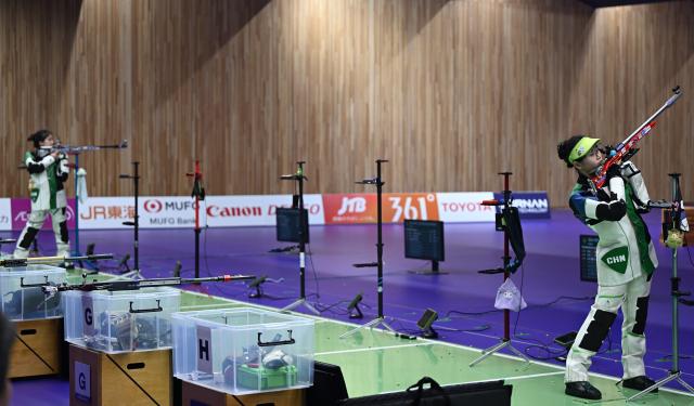 (260926) -- TOYOTA, Sept. 26, 2026 (Xinhua) -- Han Jiayu (R) and Zhang Liyuan of China compete during the 50m rifle 3 positions women individual final of shooting at the 20th Asian Games Aichi-Nagoya 2026 in Toyota of Aichi Prefecture, Japan, Sept. 26, 2026. (Xinhua/Liu Lei)