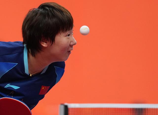 (260926) -- TOYOTA, Sept. 26, 2026 (Xinhua) -- Wang Manyu of China serves during the women's singles round 3 match of table tennis against Doo Hoi Kem of China's Hong Kong at the 20th Asian Games Aichi-Nagoya 2026 in Toyota of Aichi Prefecture, Japan, Sept. 26, 2026. (Xinhua/Cheong Kam Ka)