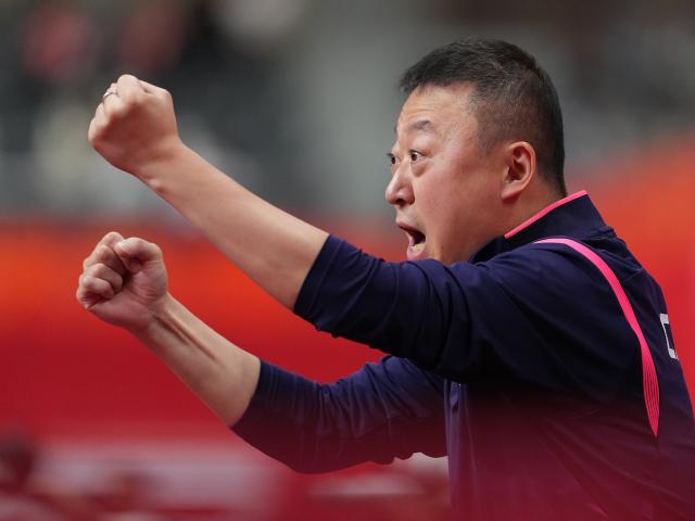 (260926) -- TOYOTA, Sept. 26, 2026 (Xinhua) -- Coach Ma Lin of China celebrates during the women's singles round 3 match of table tennis between Wang Manyu of China and Doo Hoi Kem of China's Hong Kong at the 20th Asian Games Aichi-Nagoya 2026 in Toyota of Aichi Prefecture, Japan, Sept. 26, 2026. (Xinhua/Cheong Kam Ka)