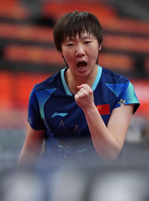 (260926) -- TOYOTA, Sept. 26, 2026 (Xinhua) -- Wang Manyu of China celebrates scoring during the women's singles round 3 match of table tennis against Doo Hoi Kem of China's Hong Kong at the 20th Asian Games Aichi-Nagoya 2026 in Toyota of Aichi Prefecture, Japan, Sept. 26, 2026. (Xinhua/Cheong Kam Ka)