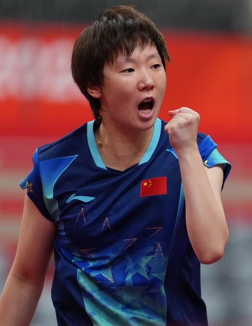 (260926) -- TOYOTA, Sept. 26, 2026 (Xinhua) -- Wang Manyu of China celebrates scoring during the women's singles round 3 match of table tennis against Doo Hoi Kem of China's Hong Kong at the 20th Asian Games Aichi-Nagoya 2026 in Toyota of Aichi Prefecture, Japan, Sept. 26, 2026. (Xinhua/Cheong Kam Ka)