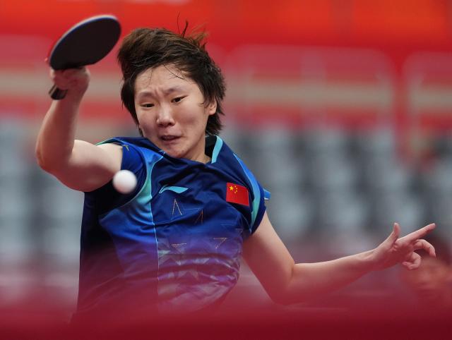 (260926) -- TOYOTA, Sept. 26, 2026 (Xinhua) -- Wang Manyu of China competes during the women's singles round 3 match of table tennis against Doo Hoi Kem of China's Hong Kong at the 20th Asian Games Aichi-Nagoya 2026 in Toyota of Aichi Prefecture, Japan, Sept. 26, 2026. (Xinhua/Cheong Kam Ka)