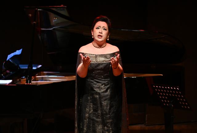 (260926) -- RIO DE JANEIRO, Sept. 26, 2026 (Xinhua) -- A singer performs during an opera concert at the Cidade das Artes in Rio de Janeiro, Brazil, Sept. 25, 2026. An opera concert themed the 2026 China-Brazil Cultural Year was staged here on Friday, with several singers from the China National Opera House presenting opera classics and well-known Chinese pieces to the local audience. (Xinhua/Jin Haoyuan)