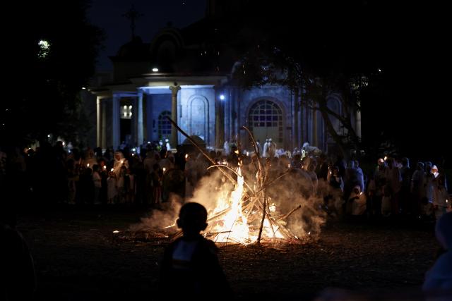 (260926) -- ADDIS ABABA, Sept. 26, 2026 (Xinhua) -- People gather around a bonfire to celebrate the Meskel festival in Addis Ababa, capital of Ethiopia, Sept. 26, 2026. Meskel is a major religious festival in Ethiopia that includes the burning of a large bonfire, known as Demera. (Xinhua/Geng Xinning)