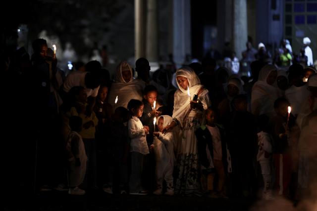 (260926) -- ADDIS ABABA, Sept. 26, 2026 (Xinhua) -- People burn candles to celebrate the Meskel festival in Addis Ababa, capital of Ethiopia, Sept. 26, 2026. Meskel is a major religious festival in Ethiopia that includes the burning of a large bonfire, known as Demera. (Xinhua/Geng Xinning)