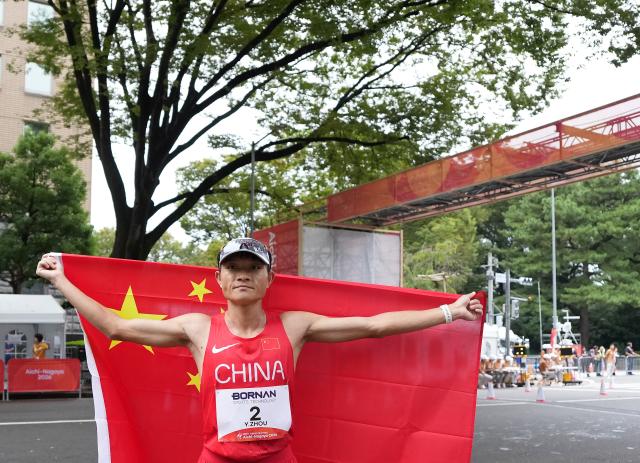 (260927) -- NAGOYA, Sept. 27, 2026 (Xinhua) -- Zhou Yingcheng of China celebrates after the men's marathon race walk final of Athletics at the 20th Asian Games Aichi-Nagoya 2026 in Nagoya, Japan, Sept. 27, 2026. (Xinhua/Jia Yuchen)