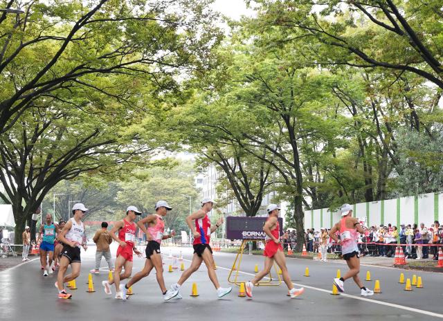 (260927) -- NAGOYA, Sept. 27, 2026 (Xinhua) -- Athletes compete during the men's marathon race walk final of Athletics at the 20th Asian Games Aichi-Nagoya 2026 in Nagoya, Japan, Sept. 27, 2026. (Xinhua/Jia Yuchen)