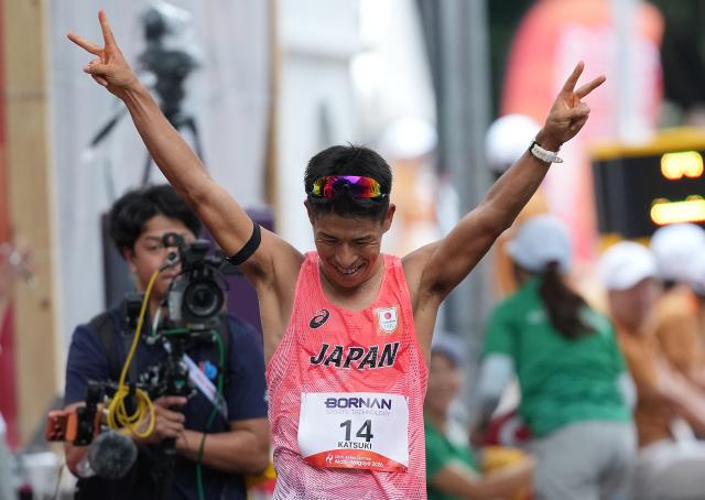 (260927) -- NAGOYA, Sept. 27, 2026 (Xinhua) -- Katsuki Hayato of Japan celebrates after the men's marathon race walk final of Athletics at the 20th Asian Games Aichi-Nagoya 2026 in Nagoya, Japan, Sept. 27, 2026. (Xinhua/Luo Yuan)