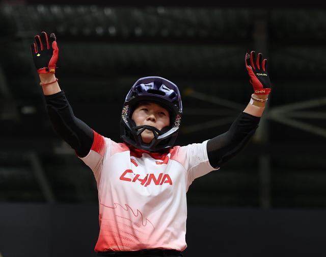 (260927) -- NAGOYA, Sept. 27, 2026 (Xinhua) -- Sun Sibei of China celebrates after the women's park final of cycling BMX freestyle at the 20th Asian Games Aichi-Nagoya 2026 in Nagoya, Japan, Sept. 27, 2026. (Xinhua/Deng Hua)