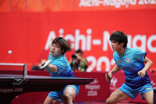 (260927) -- TOYOTA, Sept. 27, 2026 (Xinhua) -- Matsushima Sora (L)/Togami Shunsuke of Japan compete during the men's doubles semifinal table tennis match between Huang Youzheng/Lin Shidong of China and Matsushima Sora/Togami Shunsuke of Japan at the 20th Asian Games Aichi-Nagoya 2026 in Toyota of Aichi Prefecture, Japan, Sept. 27, 2026. (Xinhua/Cheong Kam Ka)