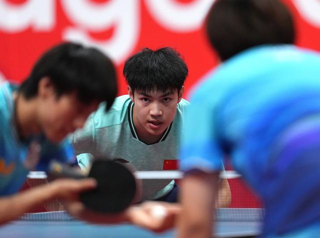 (260927) -- TOYOTA, Sept. 27, 2026 (Xinhua) -- Huang Youzheng of China reacts during the men's doubles semifinal table tennis match between Huang Youzheng/Lin Shidong of China and Matsushima Sora/Togami Shunsuke of Japan at the 20th Asian Games Aichi-Nagoya 2026 in Toyota of Aichi Prefecture, Japan, Sept. 27, 2026. (Xinhua/Cheong Kam Ka)