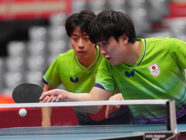 (260927) -- TOYOTA, Sept. 27, 2026 (Xinhua) -- Harimoto Tomokazu (R)/Shinozuka Hiroto of Japan compete during the men's doubles semifinal table tennis match between Xiang Peng/Wen Ruibo of China and Harimoto Tomokazu/Shinozuka Hiroto of Japan at the 20th Asian Games Aichi-Nagoya 2026 in Toyota of Aichi Prefecture, Japan, Sept. 27, 2026. (Xinhua/Wang Fei)