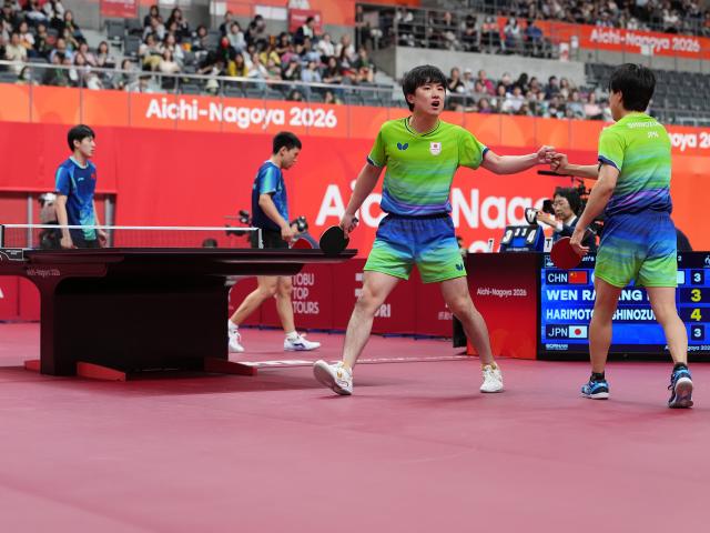 (260927) -- TOYOTA, Sept. 27, 2026 (Xinhua) -- Harimoto Tomokazu (front L)/Shinozuka Hiroto (front R) of Japan celebrate during the men's doubles semifinal table tennis match between Xiang Peng/Wen Ruibo of China and Harimoto Tomokazu/Shinozuka Hiroto of Japan at the 20th Asian Games Aichi-Nagoya 2026 in Toyota of Aichi Prefecture, Japan, Sept. 27, 2026. (Xinhua/Cheong Kam Ka)