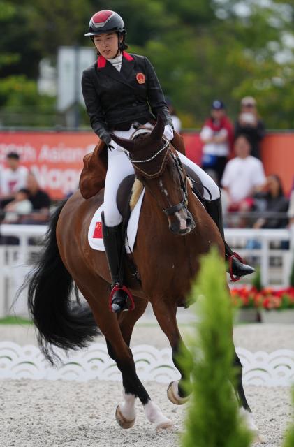(260927) -- TOKYO, Sept. 27, 2026 (Xinhua) -- Rao Jiayi of China competes during the dressage individual final of equestrian at the 20th Asian Games Aichi-Nagoya 2026 in Tokyo, Japan, Sept. 27, 2026. (Photo by Wang Shen/Xinhua)