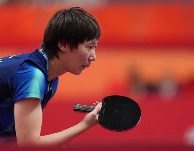 (260927) -- TOYOTA, Sept. 27, 2026 (Xinhua) -- Wang Manyu of China reacts during the women's singles semifinal table tennis match between Wang Manyu of China and Harimoto Miwa of Japan at the 20th Asian Games Aichi-Nagoya 2026 in Toyota of Aichi Prefecture, Japan, Sept. 27, 2026. (Xinhua/Cheong Kam Ka)