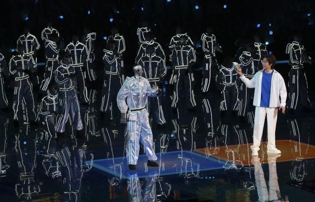 (260927) -- CHENGDU, Sept. 27, 2026 (Xinhua) -- A robot and a dancer stage a performance choreographed by Fang Zhenghua at the opening ceremony of the 48th WorldSkills Competition in Shanghai, east China, Sept. 22, 2026.
  Fang Zhenghua, a post-90s choreographer, has participated in the production of a series of eye-catching dancing performances, including a show featuring dancers and humanoid robots at the opening ceremony of the 48th WorldSkills Competition. For Fang, street dance has never been merely a passing trend.
   Fang's love for street dance began at the age of 13, when he first learned popular dance moves from television. That early fascination soon grew into a lifelong pursuit, driving him to explore new possibilities on stage. A big fan of Chinese martial arts novels since childhood, Fang has integrated Sichuan Opera face-changing techniques, traditional Kung Fu movements and other distinct Chinese cultural elements into his choreography.
   In March 2025, Fang and Homies, a street dance team of his studio Dancehome, won third place at the VIBE Dance Competition with their work "Sword and Qi in Sichuan." This was the first time a Chinese team had claimed an award in the competition's 30-year history. His team has also collaborated with domestic humanoid robot developers, staging performances that showcase China's technological advances. 
   Nearly 20 years of dedication has brought Fang to stages around the world. "When we compete abroad, our goal is not just to show the world how Chinese dancers move," he said. "We want them to see a rich, diverse China through every step we take." (Xinhua/Ding Haitao)