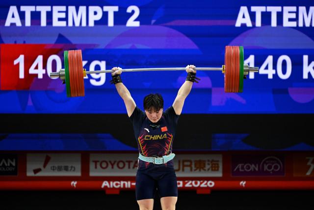 (260927) -- NAGOYA, Sept. 27, 2026 (Xinhua) -- He Renxiu of China competes during the women's 77kg final of weightlifting at the 20th Asian Games Aichi-Nagoya 2026 in Nagoya, Japan, Sept. 27, 2026. (Xinhua/Yu Yang)