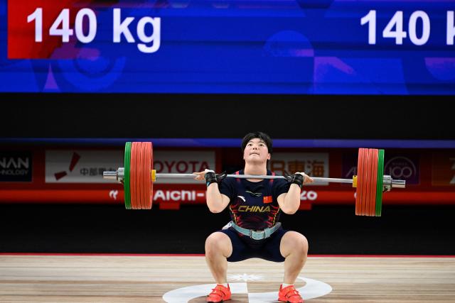 (260927) -- NAGOYA, Sept. 27, 2026 (Xinhua) -- He Renxiu of China competes during the women's 77kg final of weightlifting at the 20th Asian Games Aichi-Nagoya 2026 in Nagoya, Japan, Sept. 27, 2026. (Xinhua/Yu Yang)