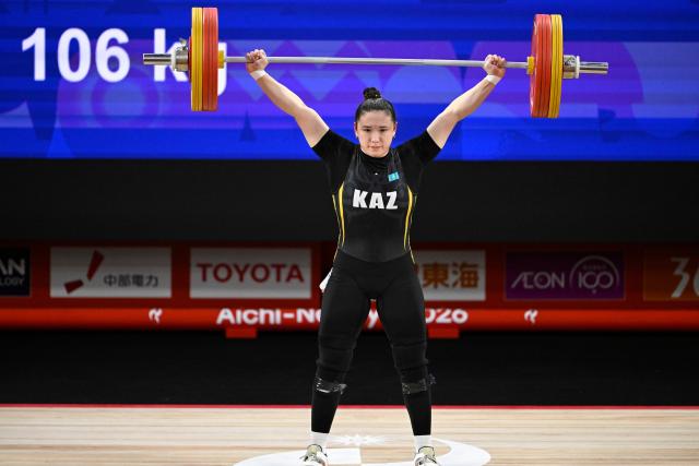 (260927) -- NAGOYA, Sept. 27, 2026 (Xinhua) -- Ayanat Zhumagali of Kazakhstan competes during the women's 77kg final of weightlifting at the 20th Asian Games Aichi-Nagoya 2026 in Nagoya, Japan, Sept. 27, 2026. (Xinhua/Yu Yang)