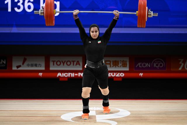 (260927) -- NAGOYA, Sept. 27, 2026 (Xinhua) -- Reihaneh Karimi of Iran competes during the women's 77kg final of weightlifting at the 20th Asian Games Aichi-Nagoya 2026 in Nagoya, Japan, Sept. 27, 2026. (Xinhua/Yu Yang)
