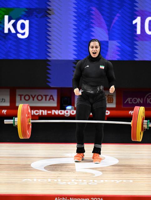 (260927) -- NAGOYA, Sept. 27, 2026 (Xinhua) -- Reihaneh Karimi of Iran reacts after the women's 77kg final of weightlifting at the 20th Asian Games Aichi-Nagoya 2026 in Nagoya, Japan, Sept. 27, 2026. (Xinhua/Yu Yang)