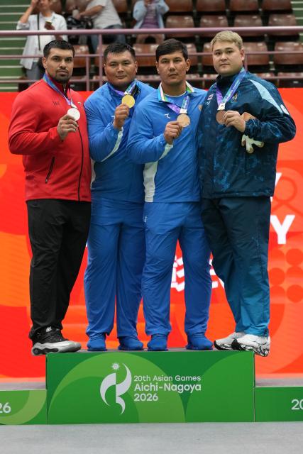 (260927) -- NAGOYA, Sept. 27, 2026 (Xinhua) -- Gold medalist Shokhrukhkhon Bakhtiyorov (2nd L) of Uzbekistan, silver medalist Shakarmamad Mirmamadov (1st L) of Tajikistan, and bronze medalists Bekmurod Oltiboev (2nd R) of Uzbekistan and Kunathip Yea-on of Thailand pose during the awarding ceremony after the men's +90kg final of Kurash at the 20th Asian Games Aichi-Nagoya 2026 in Nagoya, Japan, Sept. 27, 2026. (Xinhua/Hou Zhaokang)
