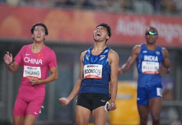 (260927) -- NAGOYA, Sept. 27, 2026 (Xinhua) -- Puripol Boonson (C) of Thailand celebrates after the men's 200m final match of Athletics at the 20th Asian Games Aichi-Nagoya 2026 in Nagoya, Japan, Sept. 27, 2026. (Xinhua/Jia Yuchen)
