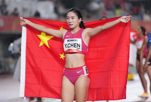 (260927) -- NAGOYA, Sept. 27, 2026 (Xinhua) -- Chen Yujie of China celebrates after the women's 200m final of Athletics at the 20th Asian Games Aichi-Nagoya 2026 in Nagoya, Japan, Sept. 27, 2026. (Xinhua/Jia Yuchen)