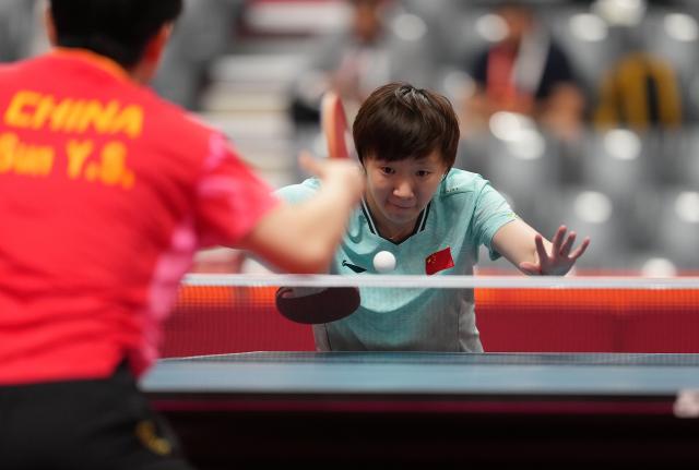 (260927) -- TOYOTA, Sept. 27, 2026 (Xinhua) -- Wang Manyu competes during the women's singles final table tennis match between Sun Yingsha of China and Wang Mnayu of China at the 20th Asian Games Aichi-Nagoya 2026 in Toyota of Aichi Prefecture, Japan, Sept. 27, 2026. (Xinhua/Wang Fei)