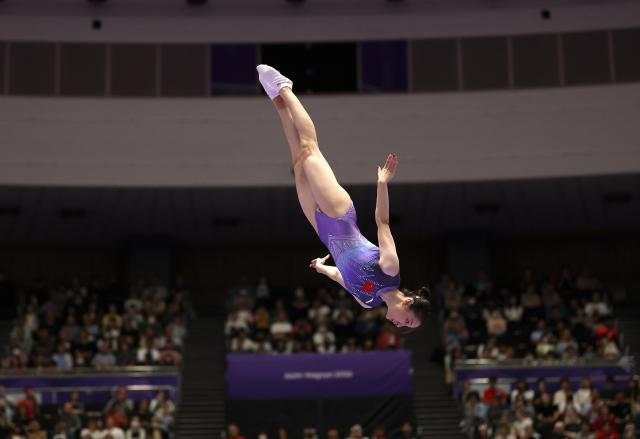 (260927) -- NAGOYA, Sept. 27, 2026 (Xinhua) -- Qiu Zheng of China competes during the women's super final match of Trampoline Gymnastics at the 20th Asian Games Aichi-Nagoya 2026 in Nagoya, Japan, Sept. 27, 2026. (Xinhua/Xu Yanan)