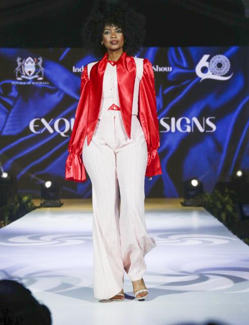(260927) -- GABORONE, Sept. 27, 2026 (Xinhua) -- A model presents creations during the national independence fashion show at the historic Main Mall in Gaborone, Botswana, Sept. 26, 2026. The fashion show was held here on Saturday night as one of the events to mark the 60th anniversary of Botswana's independence. (Xinhua/Tshekiso Tebalo)