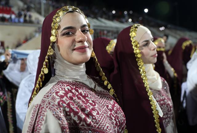 (260927) -- HEBRON, Sept. 27, 2026 (Xinhua) -- Brides attend a mass wedding ceremony in Dura near the West Bank city of Hebron, on Sept. 26, 2026. The mass wedding ceremony brought together 88 Palestinian grooms and brides, with thousands of local residents attending the event. (Photo by Mamoun Wazwaz/Xinhua)