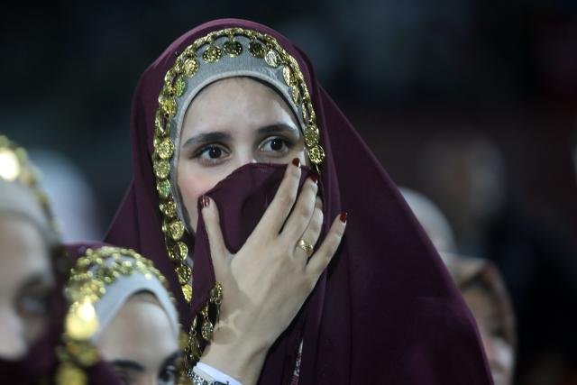 (260927) -- HEBRON, Sept. 27, 2026 (Xinhua) -- A bride attends a mass wedding ceremony in Dura near the West Bank city of Hebron, on Sept. 26, 2026. The mass wedding ceremony brought together 88 Palestinian grooms and brides, with thousands of local residents attending the event. (Photo by Mamoun Wazwaz/Xinhua)