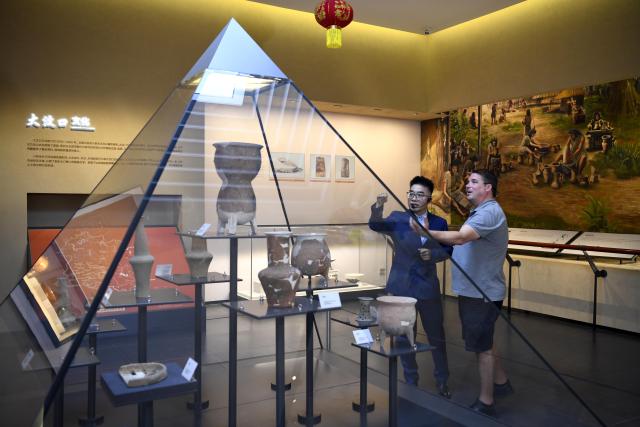 (260928) -- RIZHAO, Sept. 28, 2026 (Xinhua) -- Ryan Norman (R) visits Rizhao Museum in Rizhao, east China's Shandong Province, Sept. 24, 2026.
  Ryan Norman, from the U.S. state of California, has lived in Rizhao for 20 years. He married a Chinese woman and regards Rizhao as his second home. For more than three years, he has been sharing daily life in the city through short videos. His videos have attracted more than 5 million followers across social media platforms, earning him the nickname "Lei Ge," or "Brother Lei," among Chinese netizens.
  Beyond his work on social media, Norman runs several businesses, including a cafe and a chicken restaurant. He is also a fan of both Sichuan and Shandong cuisines and especially loves spicy food, joking that he has developed a "Chinese stomach."
  For Norman, the opportunities brought by China's development and the warmth he finds in everyday life are key reasons he has chosen to stay. He hopes to use his videos and personal experience to help foster greater understanding and friendship between people in China and the United States.
  In Norman's view, the Chinese market is a large platform, and the rapid development of China's economy has brought tremendous opportunities to merchants and enterprises all over the world. (Xinhua/Guo Xulei)