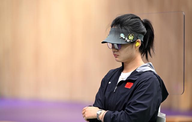 (260928) -- TOYOTA, Sept. 28, 2026 (Xinhua) -- Shang Kaiyan of team China reacts during the 25m pistol women team final of shooting at the 20th Asian Games Aichi-Nagoya 2026 in Toyota of Aichi Prefecture, Japan, Sept. 28, 2026. (Xinhua/Liu Lei)