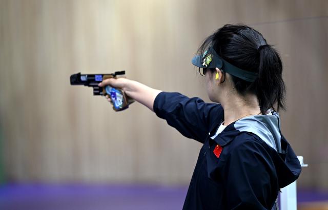 (260928) -- TOYOTA, Sept. 28, 2026 (Xinhua) -- Shang Kaiyan of team China competes during the 25m pistol women team final of shooting at the 20th Asian Games Aichi-Nagoya 2026 in Toyota of Aichi Prefecture, Japan, Sept. 28, 2026. (Xinhua/Liu Lei)