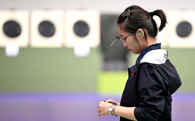 (260928) -- TOYOTA, Sept. 28, 2026 (Xinhua) -- Yao Qianxun of team China reacts during the 25m pistol women team final of shooting at the 20th Asian Games Aichi-Nagoya 2026 in Toyota of Aichi Prefecture, Japan, Sept. 28, 2026. (Xinhua/Liu Lei)