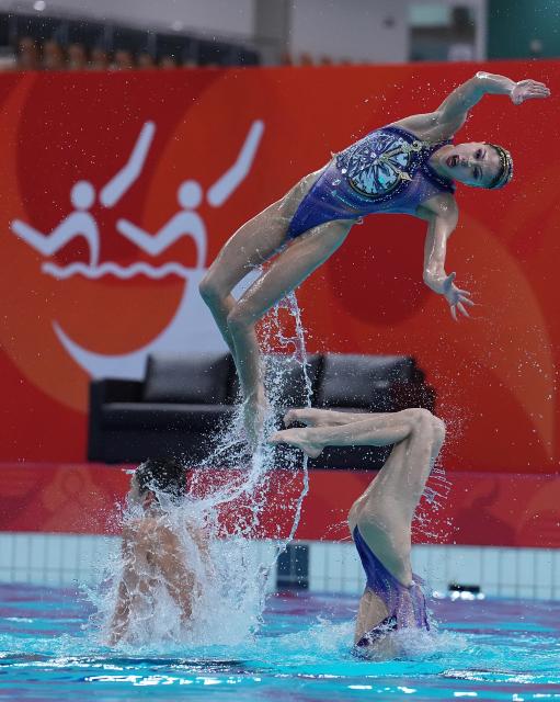 (260928) -- SHIZUOKA, Sept. 28, 2026 (Xinhua) -- Team China compete during the mixed team free routine of artistic swimming at the 20th Asian Games Aichi-Nagoya 2026 in Shizuoka, Japan, Sept. 28, 2026. (Xinhua/Cen Yunpeng)